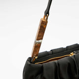 Extra in Black Bag
