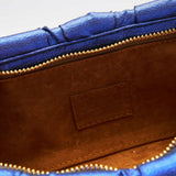 Extra in Metallic Blue