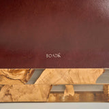 Origin in Reddish Brown